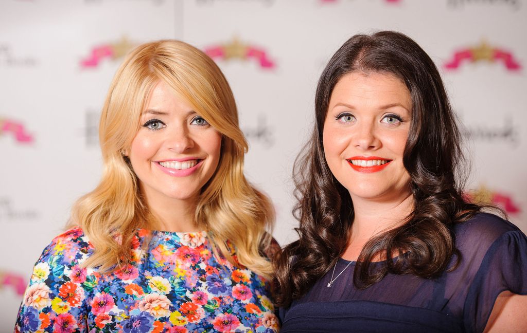 Holly Willoughby and sister Kelly Willoughby at School for Stars book signing in london