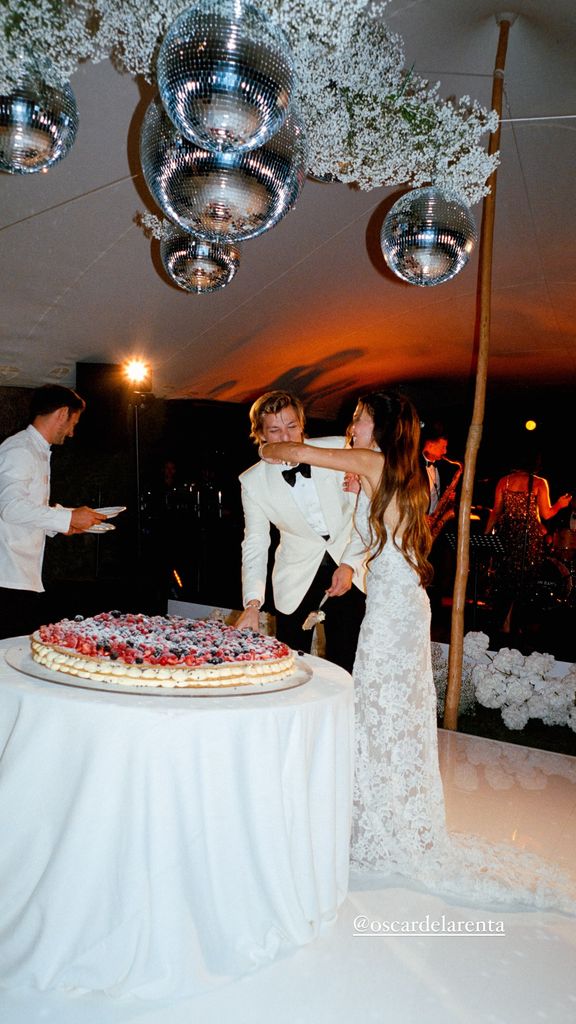 The couple celebrated with a giant Millefoglie wedding cake made in front of them at their wedding reception