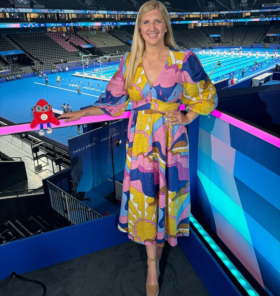 Rebecca Adlington wears a yellow and blue and pink patterened dress from Boden at the Olympics 2024