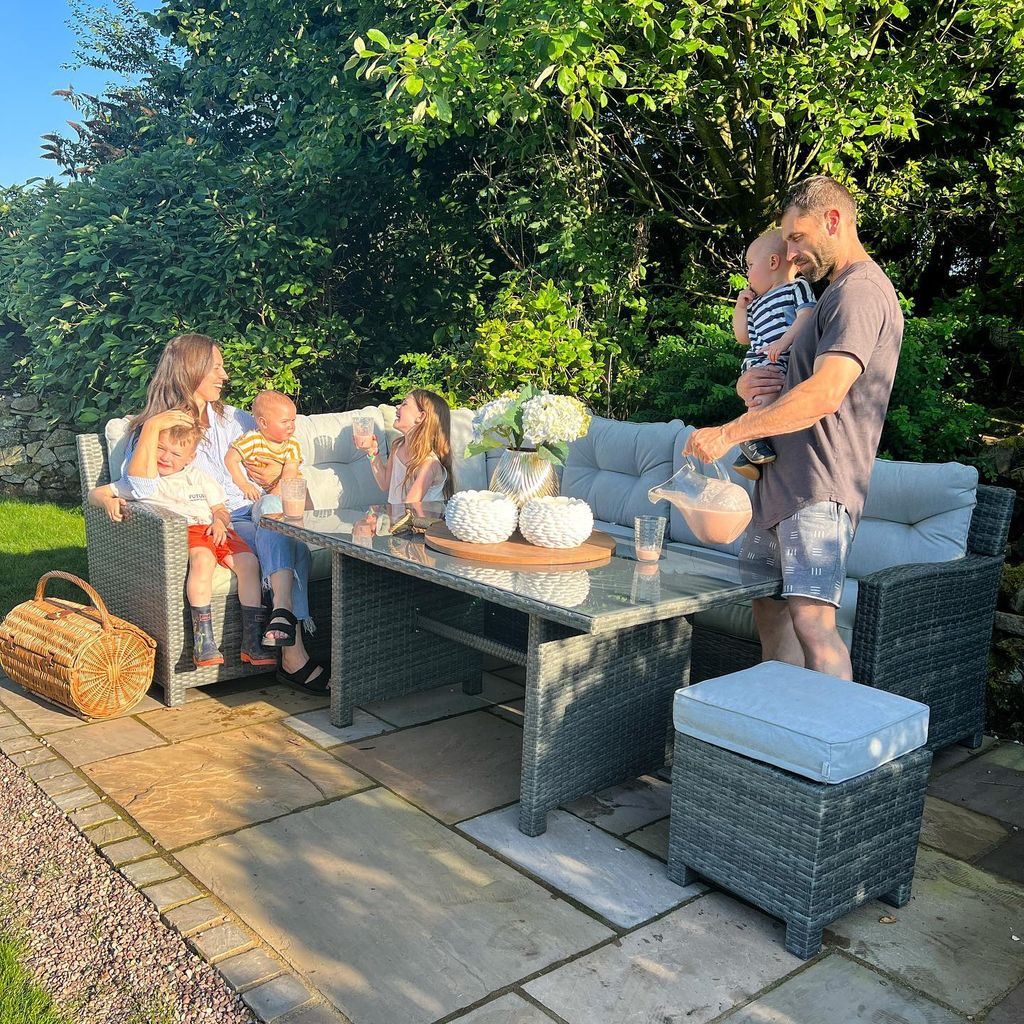 Kelvin shared a heartwarming photo of Liz and the children enjoying freshly made smoothies in the garden this summer