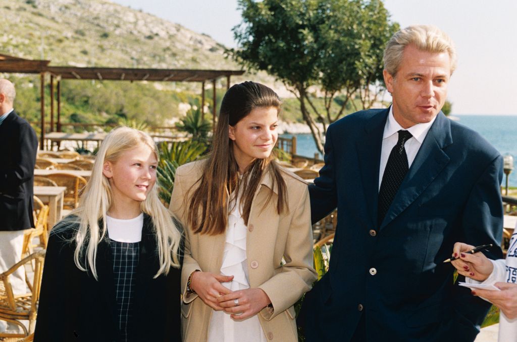 Athina Onassis with her father Thierry Roussel and a young blonde woman