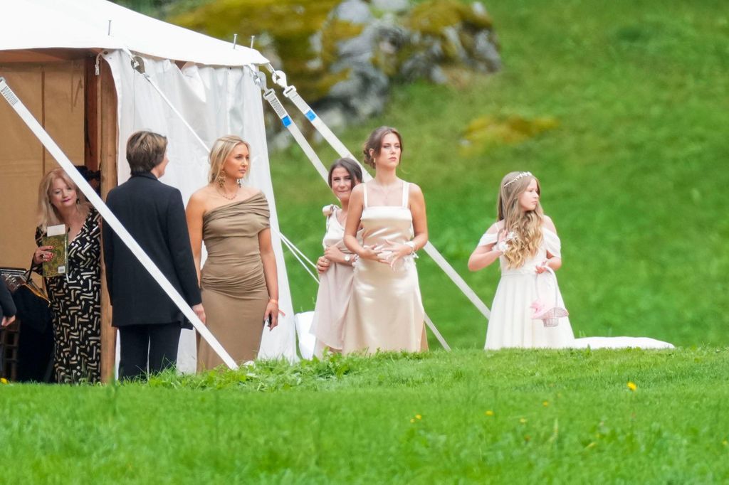 Märtha Louise's daughters Leah and Emma arrive at their mother's wedding with some of the bridal party