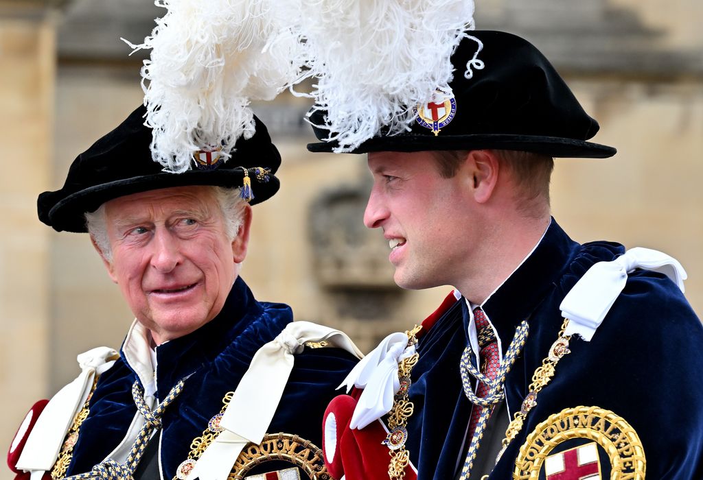 King Charles and Prince William in feathered caps