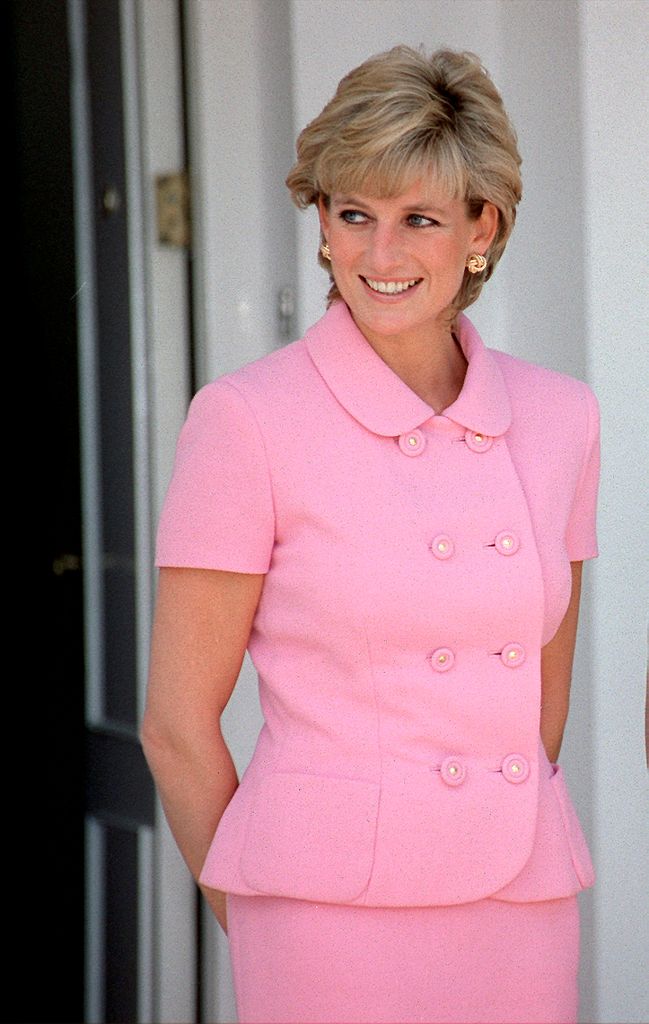 Princess Diana wearing a tailored pink skirt suit 