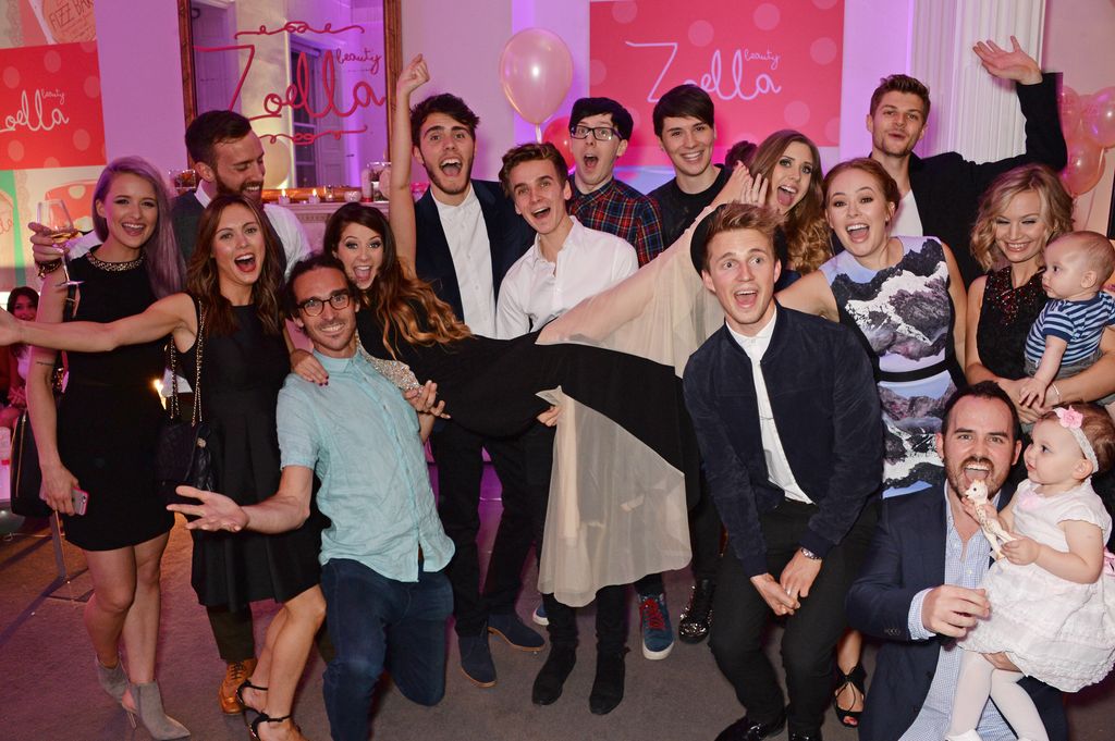 Youtubers Victoria Magrath, guests, Louis Cole, Zoe Sugg, Alfie Deyes, Joe Sugg, Phil Lester, Dan Howell, Marcus Butler, Hazel Hayes, Tanya Burr, Jim Chapman, Jonathan Joly and Anna Saccone attend YouTube phenomenon Zoe Sugg's (Zoella) launch of her debut beauty collection at 41 Portland Place on September 25, 2014 in London, England