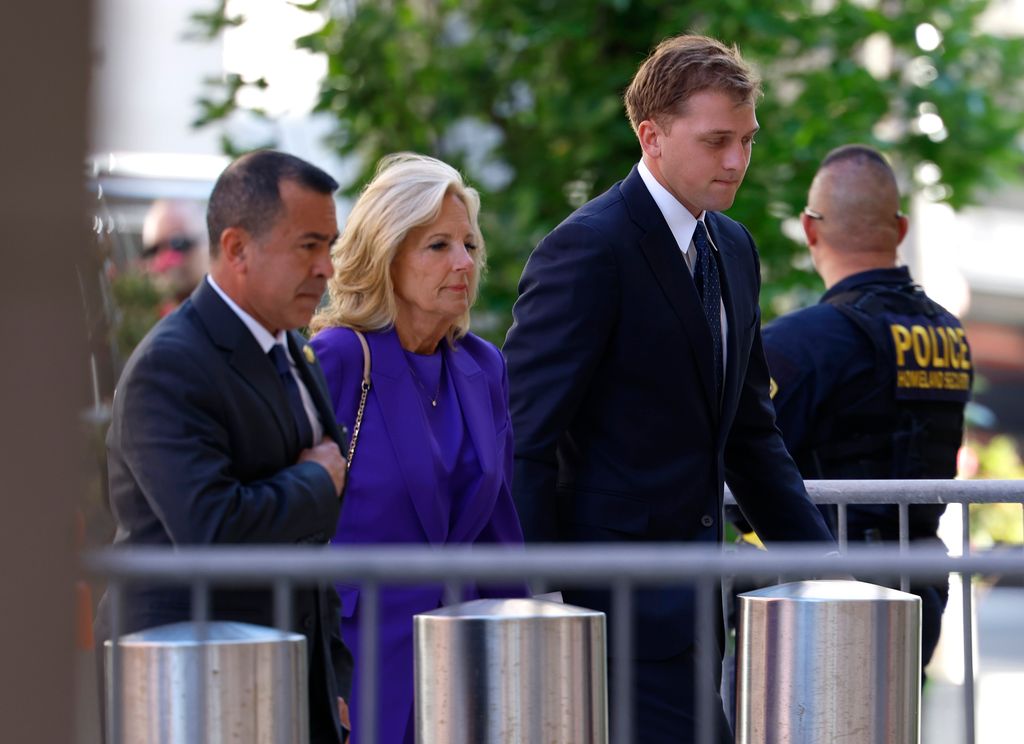 First lady Jill Biden, joined by Peter Neal (R) arrives at the J. Caleb Boggs Federal Building for the start of U.S. President Joe Biden's son Hunter Biden's trial on June 03, 2024 in Wilmington, Delaware. Biden is standing trial for felony gun charges