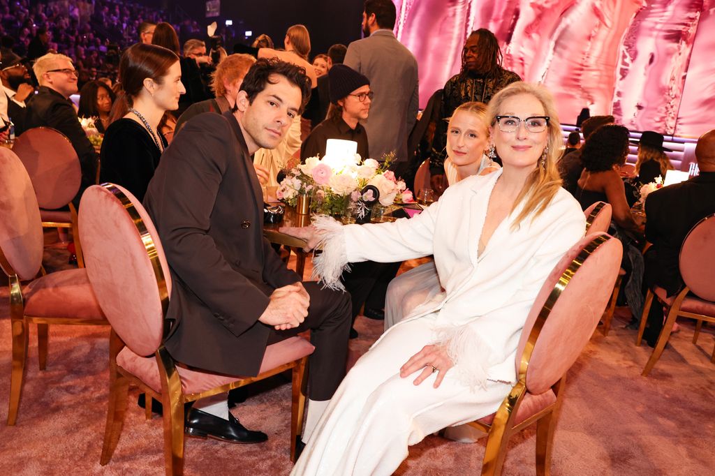 Meryl Streep sits with her son-in-law Mark Ronson at the 66th GRAMMY Awards at Crypto.com Arena on February 04, 2024