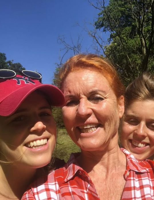 Princess Eugenie, Sarah Ferguson and Princess Beatrice smiling for a selfie