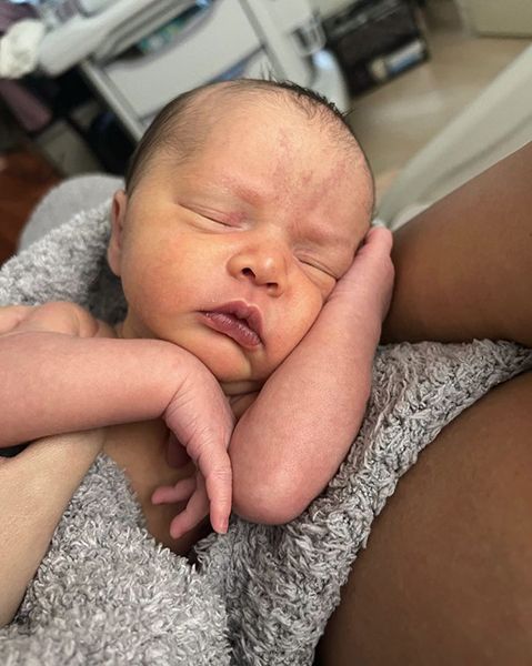 chrissy teigen first photo baby daughters face