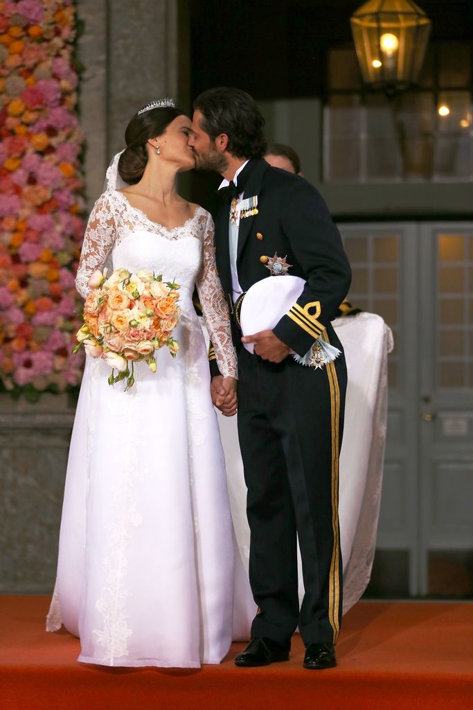 Prince Carl Philip of Sweden kisses his new wife Princess Sofia of Sweden after their marriage