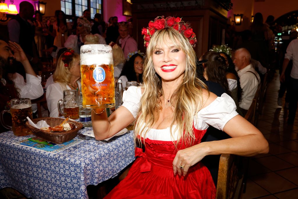 Heidi wearing a classic red and white dirndl