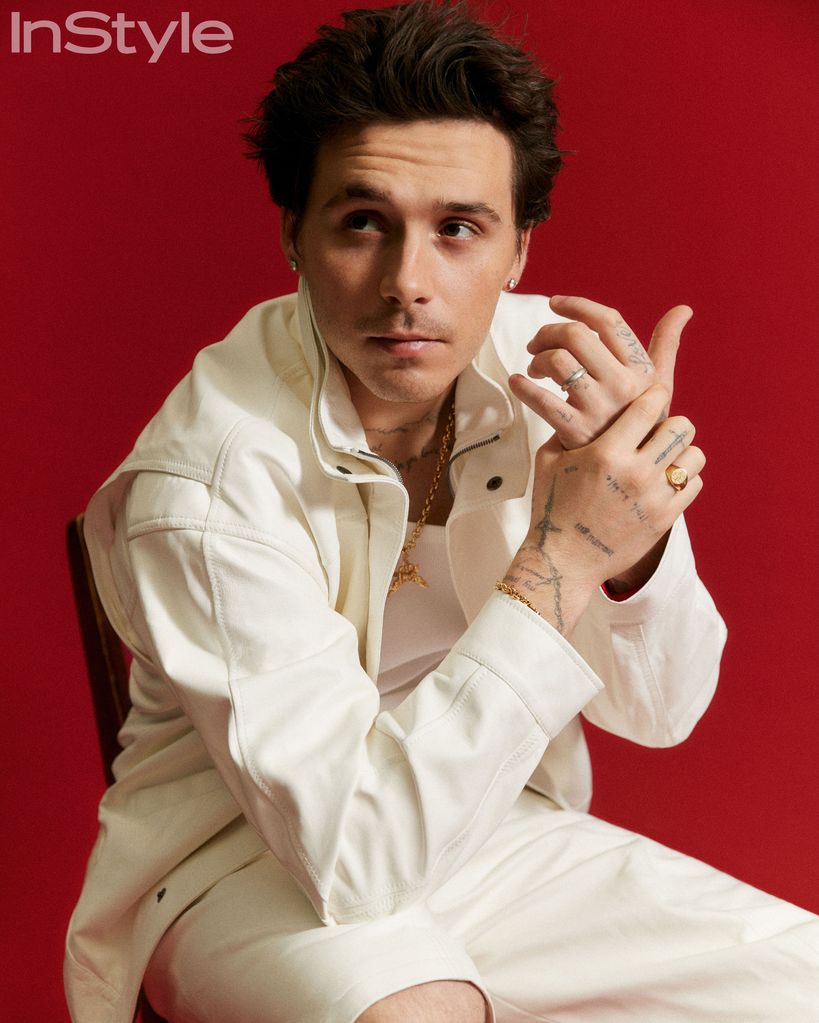 brooklyn beckham in white outfit 