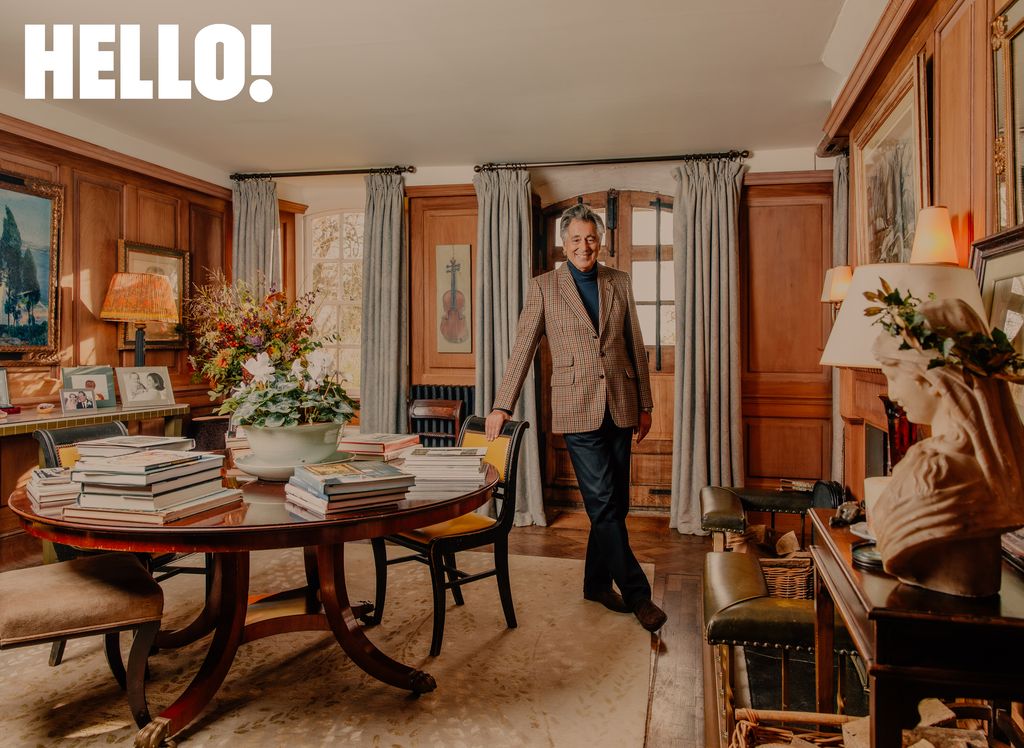 Emmanuel Olympitis in one the dining rooms scattered with books