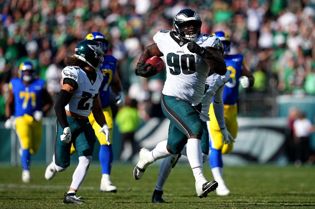 Jordan Davis #90 of the Philadelphia Eagles returns a blocked field goal for a touchdown against the Los Angeles Rams during the fourth quarter