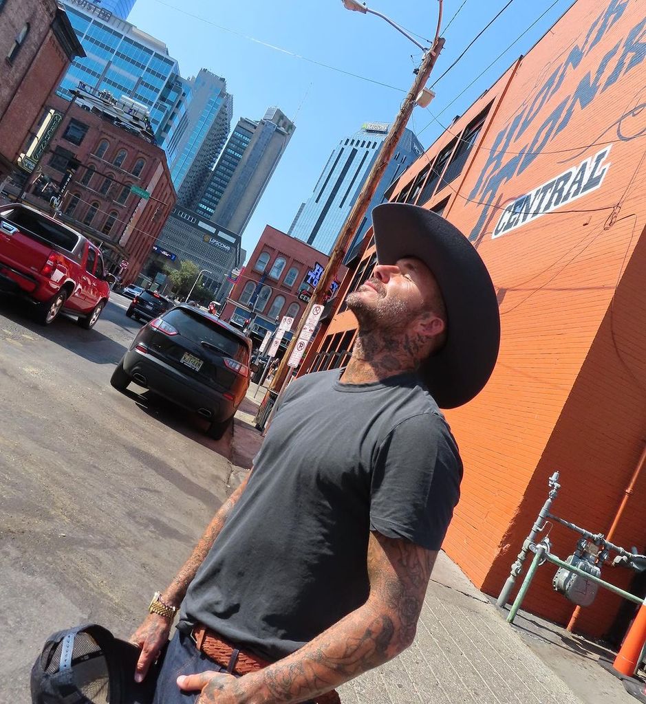 David Beckham looking at the sun in a cowboy hat