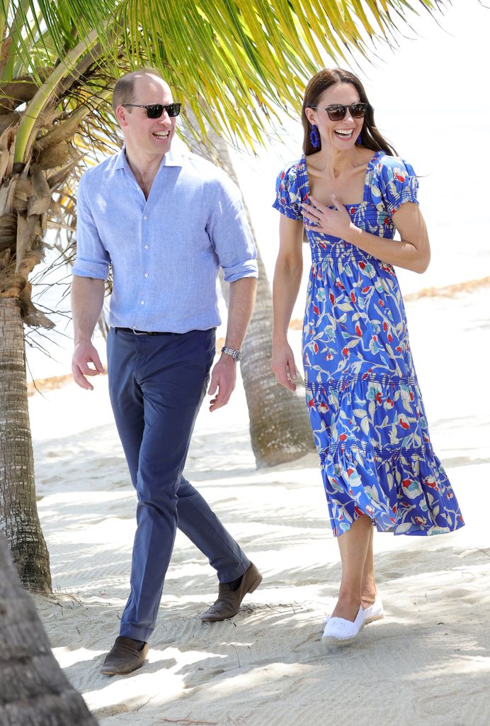 william and kate walking along beach in belize