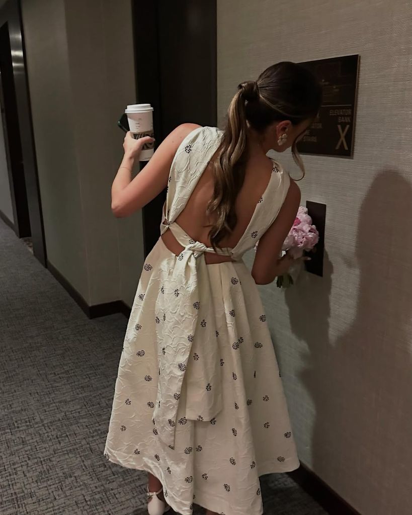 Princess Iman of Iran in a backless white floral dress