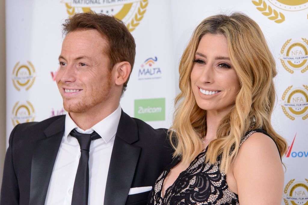 Stacey Solomon and Joe Swash posing for photos on the red carpet