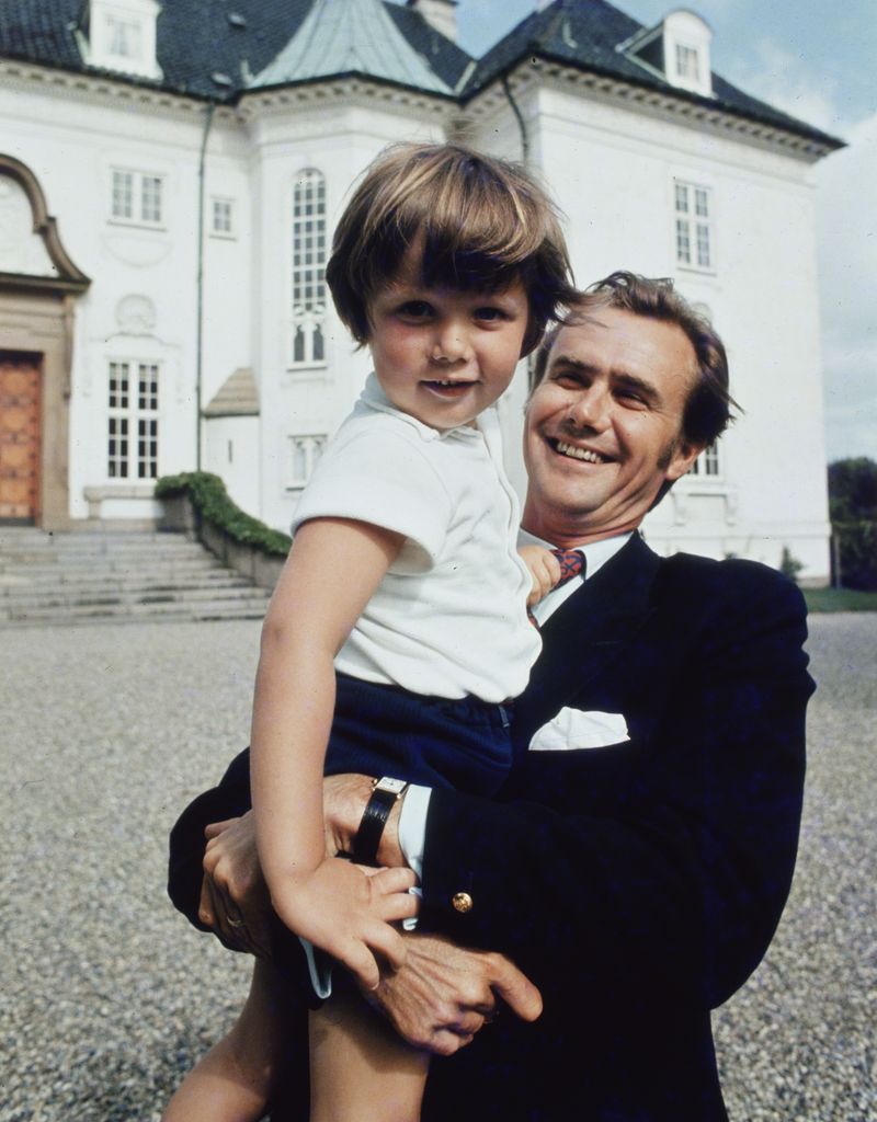 Prince Henrik of Denmark, the husband of Queen Margrethe, with their son Crown Prince Frederik during a holiday at Marselisborg Castle, Aarhus, Jutland.