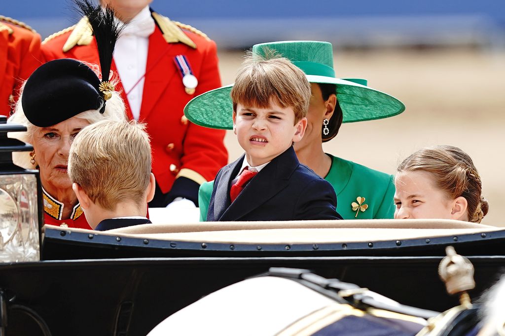 Prince Louis sits up in the carriage at Trooping the Colour