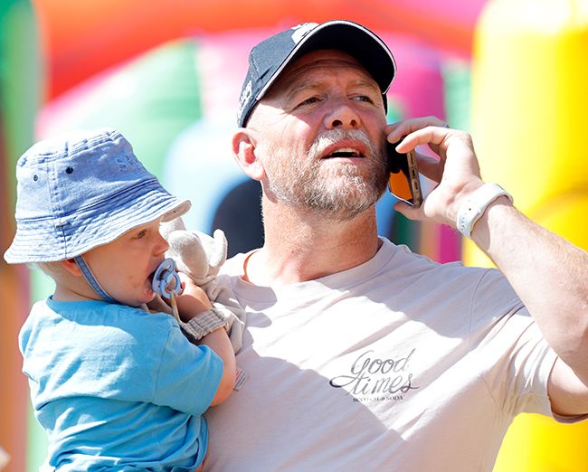 Mike Tindall holding son Lucas