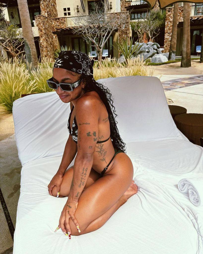 Jordan Chiles shares photos wearing a string bikini from a recent getaway, posted on Instagram