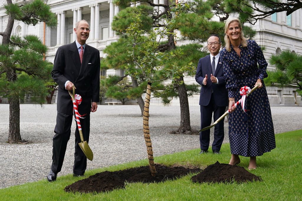 A photo of the Duke and Duchess of Edinburgh planting a tree in Tokyo