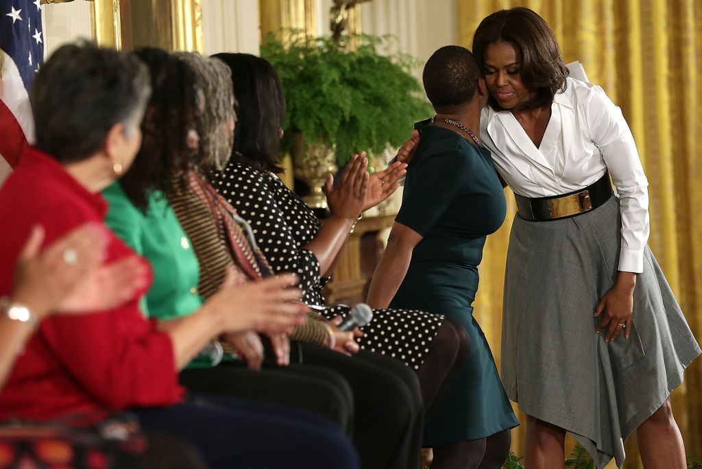 Michelle Obama greeting women for Black History Month