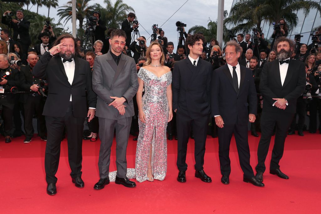 Léa posing on the red carpet with the cast of The Second Act