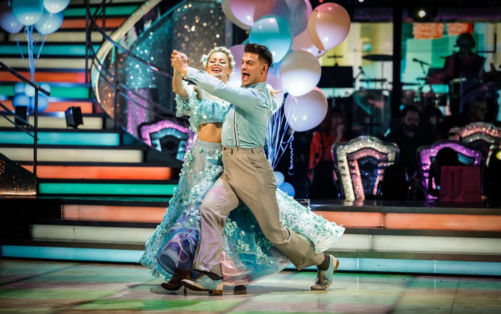 Tasha Ghouri and Aljaz Skorjanec dancing a quickstep