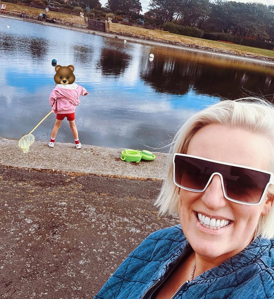 Steph assured the commenters that her daughter's grandad was also on the water's edge