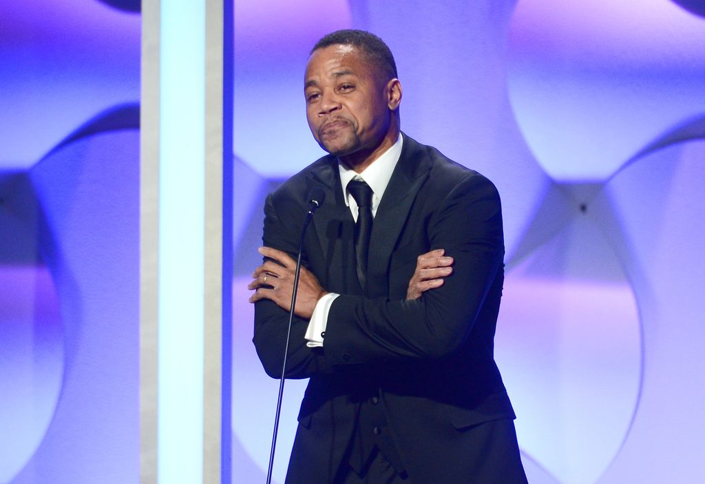Cuba Gooding Jr. speaks onstage during the 27th American Cinematheque Award honoring Jerry Bruckheimer at The Beverly Hilton Hotel on December 12, 2013 in Beverly Hills, California