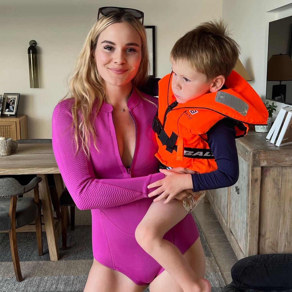 Holly and Oscar Ramsay prepared to paddle board from their Cornish home in a sweet Instagram post
