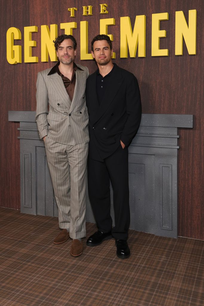 Daniel Ings and Theo James attend the Los Angeles photo call for Netflix's "The Gentlemen" at Netflix Tudum Theater on February 28, 2024 in Los Angeles, California