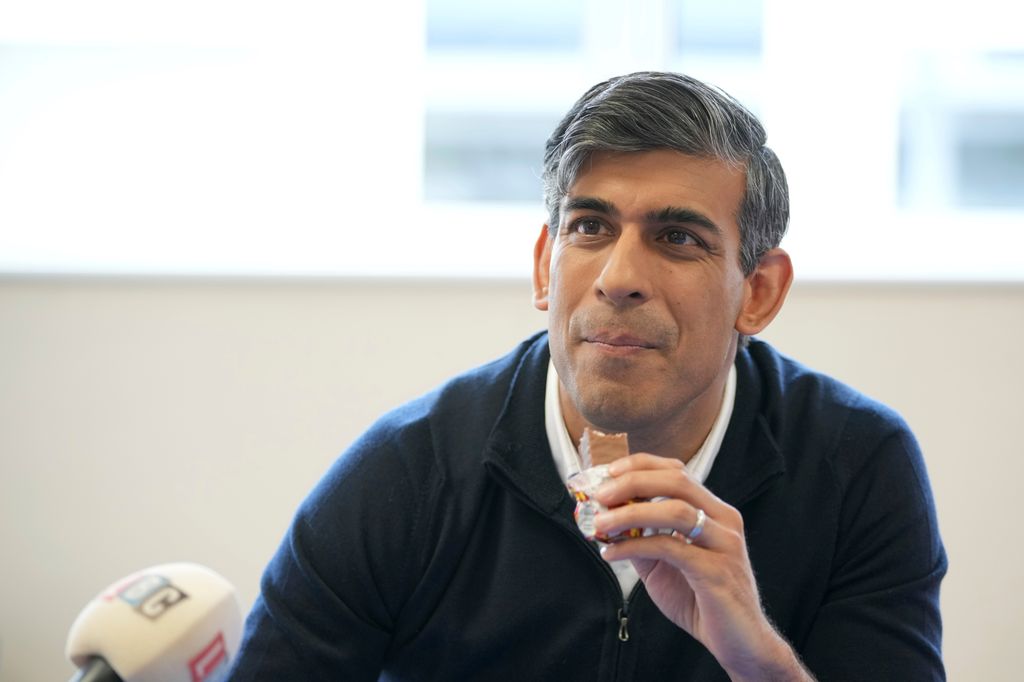 Rishi Sunak eating a chocolate bar