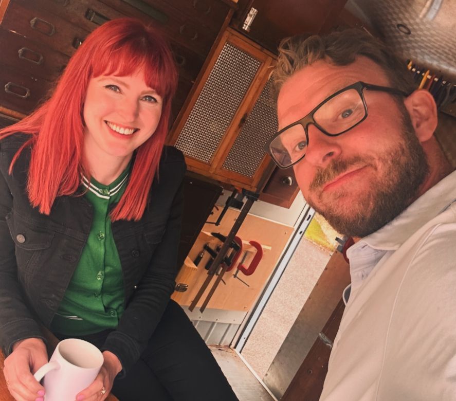 Izzie Balmer and JJ Chalmers sitting together