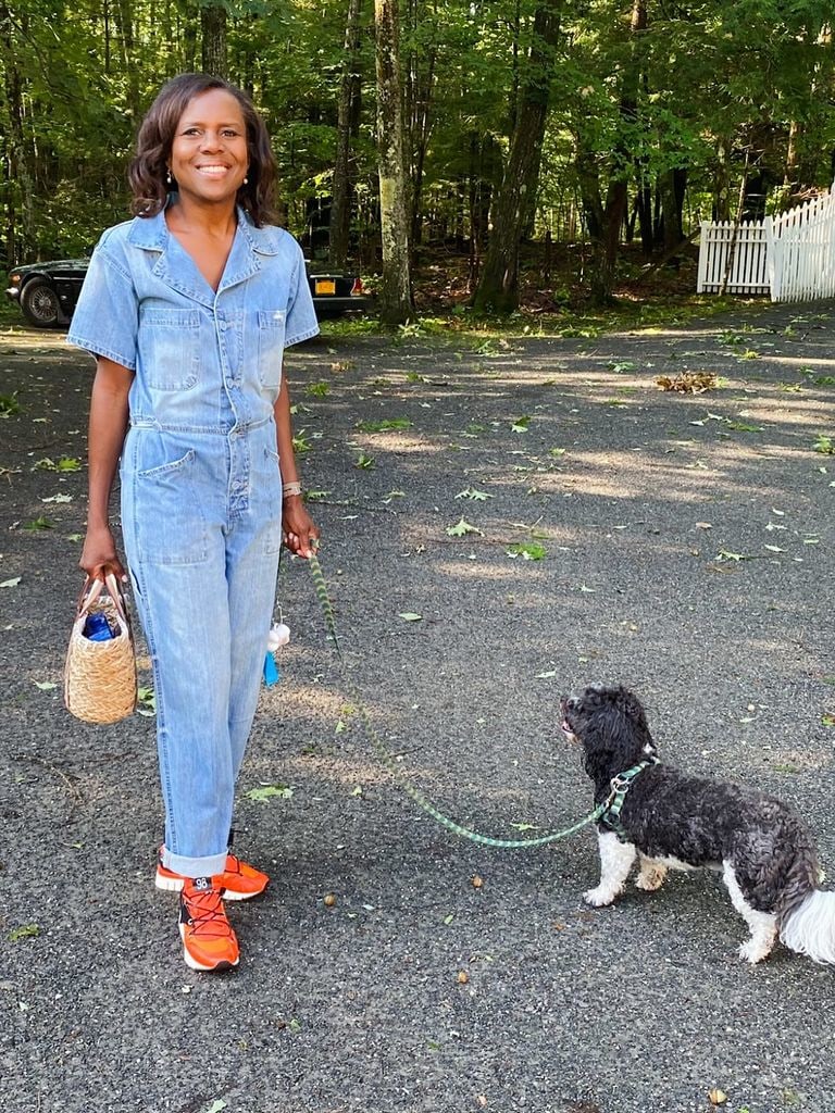 deborah roberts holding late dog pepper on a leash