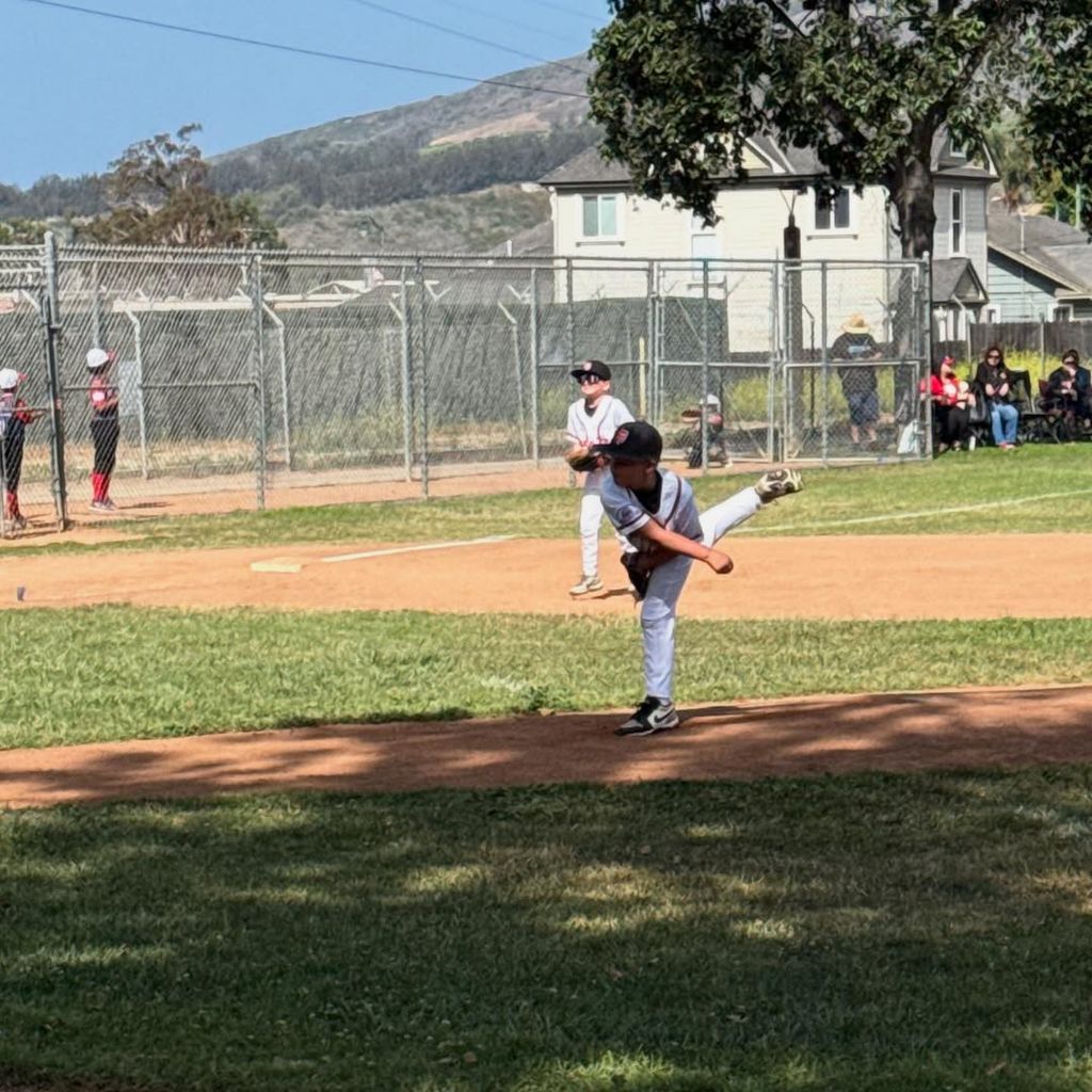 Jameson Hart captured in the middle of a pitch in his little league baseball match, photographed by dad Carey Hart and shared on Instagram