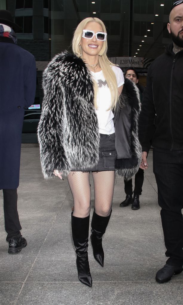 Gwen Stefani out in fur coat and mini skirt