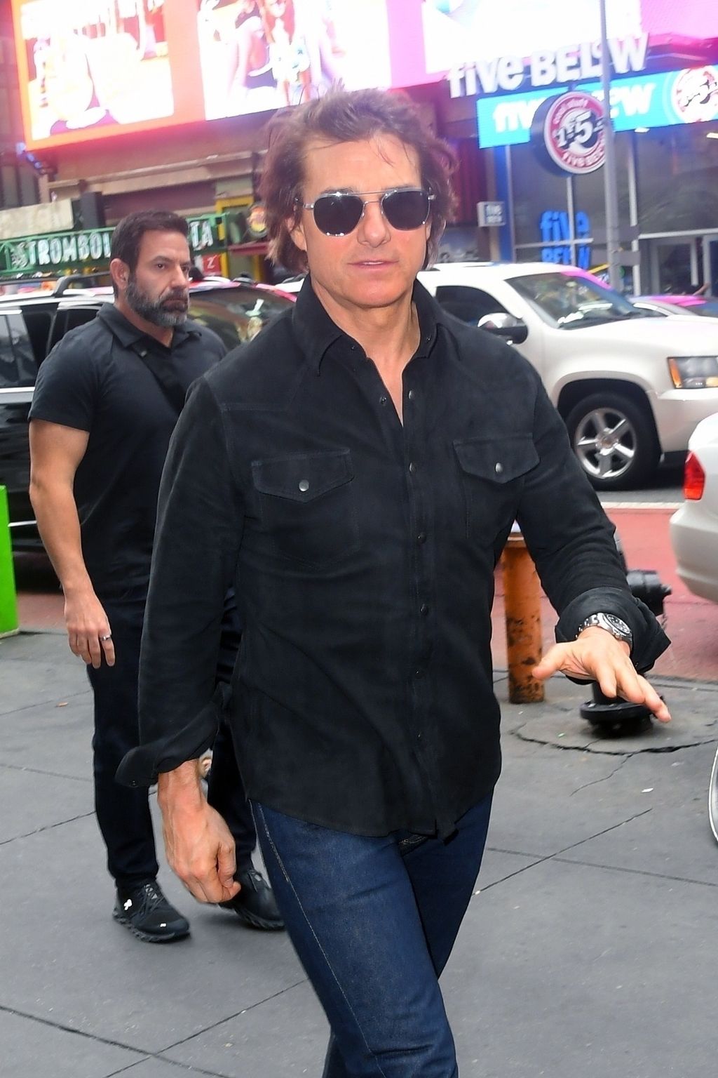 Tom Cruise is seen arriving at AMC in Times Square promoting his latest Mission: Impossible film 