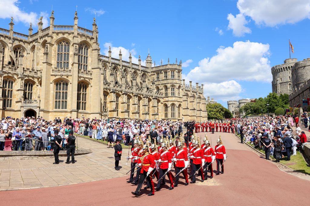  Members of the Household Cavalry Regiment marching ahead of the Order Of The Garter Service at Windsor Castle