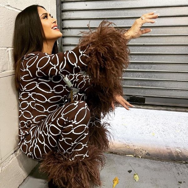 salma hayek in a feathered jumpsuit