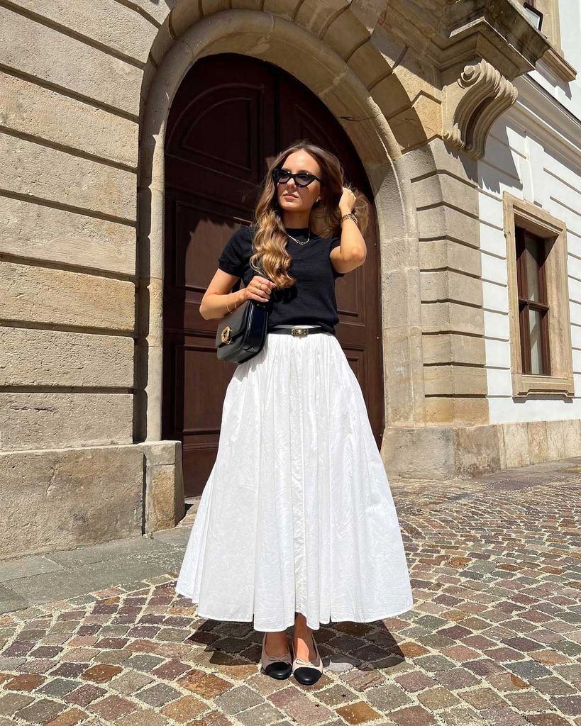 INfluencer Rebeka Baráth wearing a white cotton maxi skirt