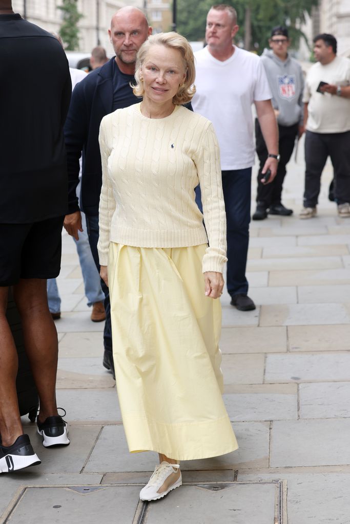 Pamela Anderson looked stylish in a butter-yellow ensemble