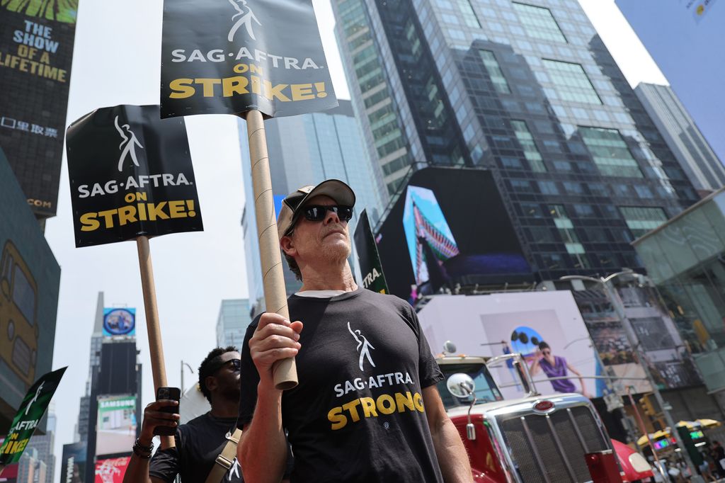 Kevin Bacon and SAG-AFTRA members and supporters protest as the SAG-AFTRA Actors Union Strike continues on Day 5 in front of Paramount Studios at 1515 Broadway on July 17, 2023 in New York City. Members of SAG-AFTRA, Hollywoodâs largest union which repr