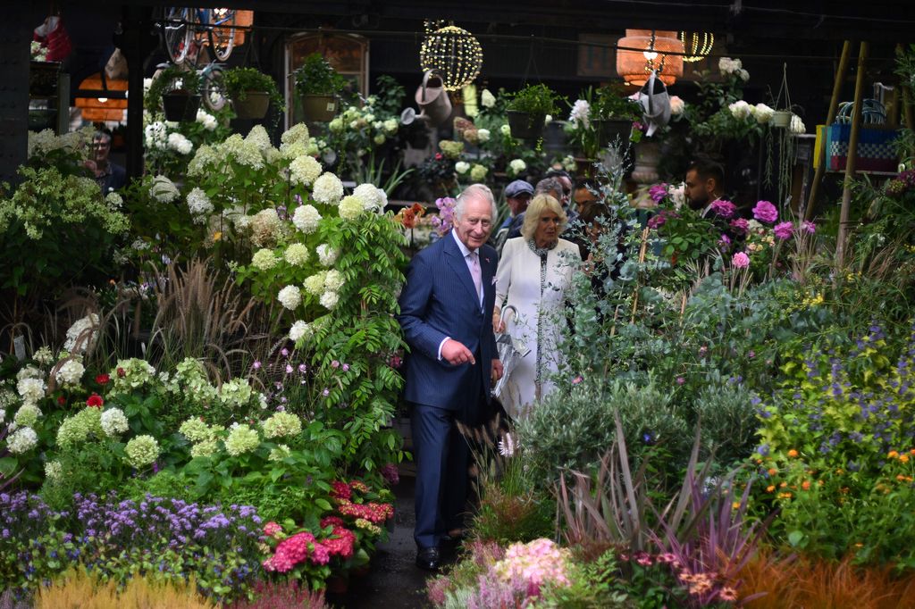 Charles and Camilla visit the central Paris Flower Market