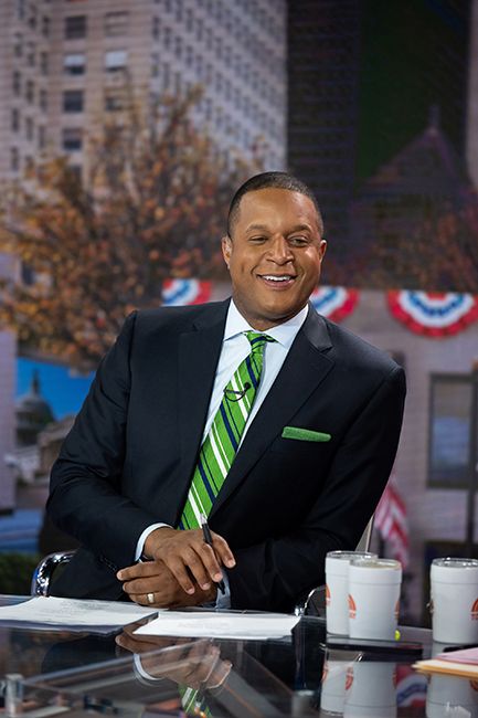 Craig Melvin smiles as he sits at Today Show desk