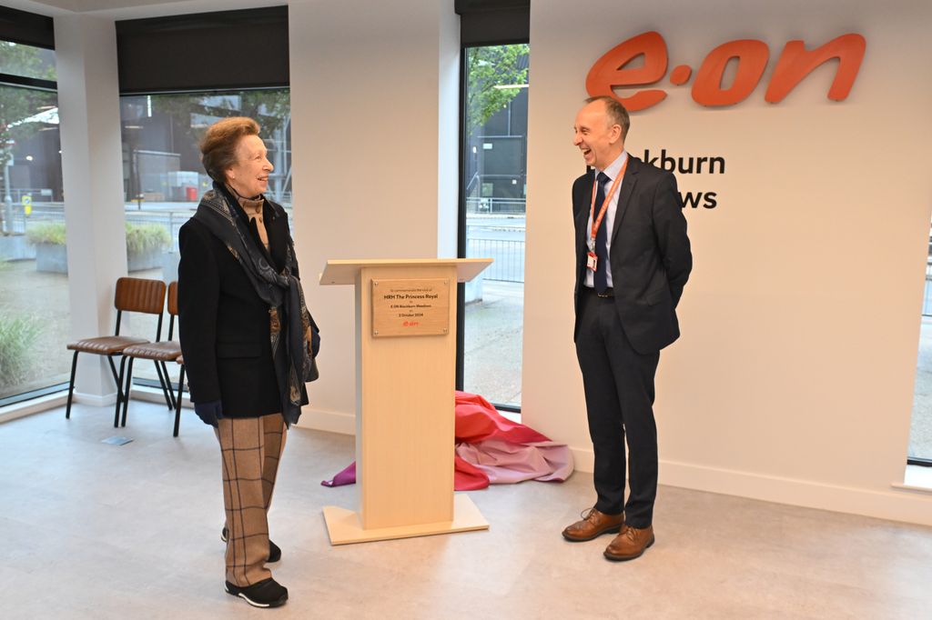   Anne, Princess Royal reacts with Chris Lovatt of E.ON as she visits E.ON's Blackburn Meadows renewable energy plant to tour the site and meet the team on October 2, 2024 in Sheffield, England