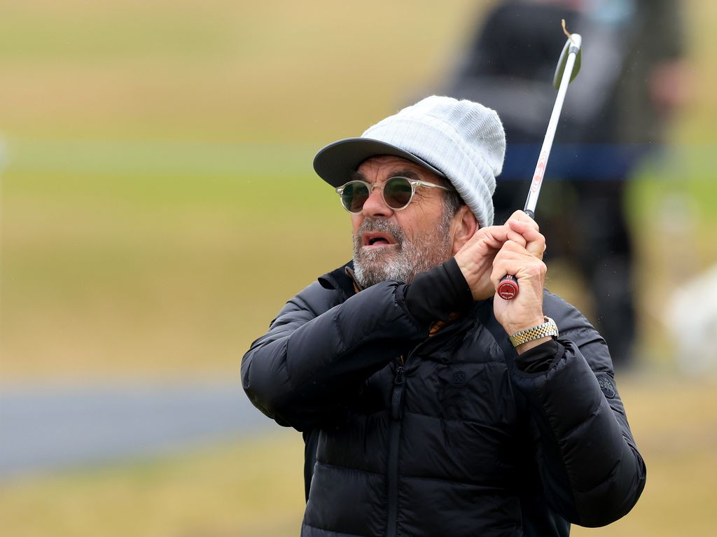 Huey Lewis of The United States plays his second shot on the fourth hole during the final round of the Alfred Dunhill Links Championship 2024 at the Old Course at St Andrews on October 06, 2024 in St Andrews, Scotland