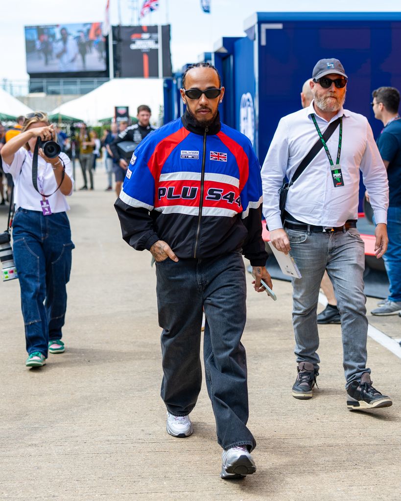 Lewis Hamilton of Great Britain and Ferrari walks in the paddock during practice ahead of the F1 Grand Prix of Great Britain at Silverstone Circuit on July 4, 2025 in Northampton, United Kingdom. (Photo by Kym Illman/Getty Images)